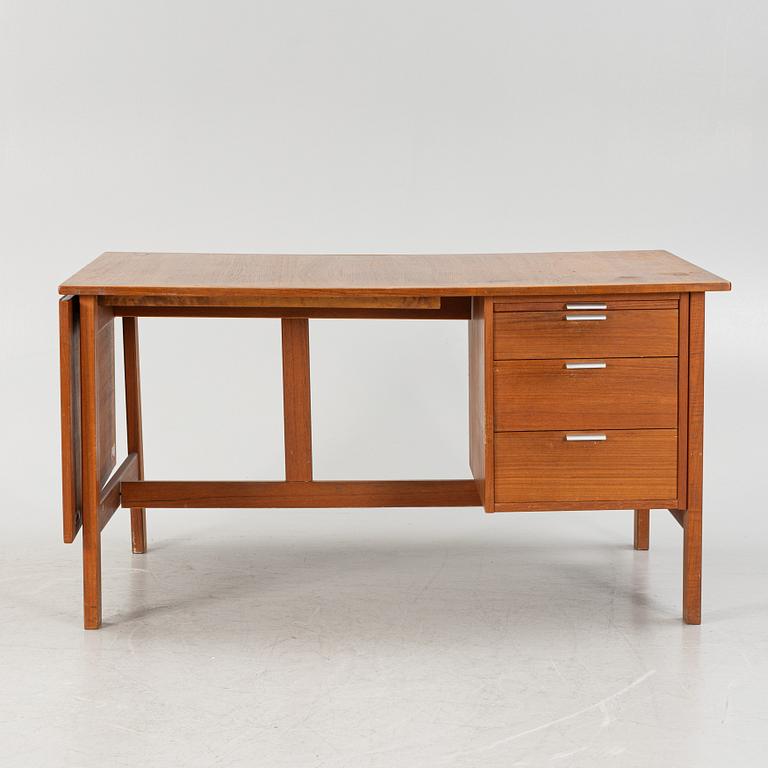 A 1960's teak desk.