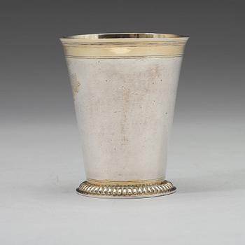 A Baltic 18th century parcel-gilt beaker, mark of Johann Heinrich Tenten, Mitau (1732-1739).