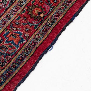 An antique Moud carpet of 'Ardabil' design, approximately 445.5 x 332 cm.