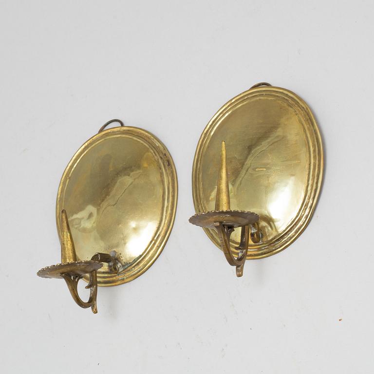 A pair of 18th century brass wall scones.