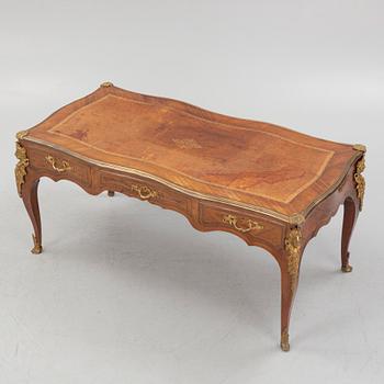 A French Louis XV-style rosewood marquetry 'Bureau plat aux bustes de femmes", late 19th century.