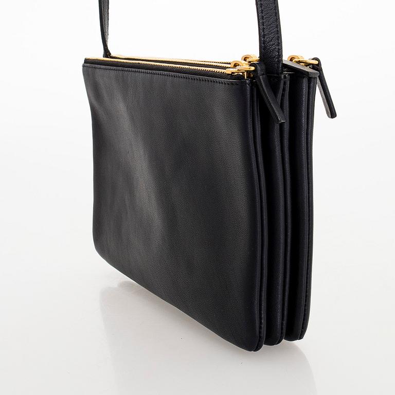 Céline, a black leather 'Trio Small' bag.