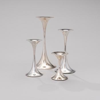 A set of four candlesticks signed. TW. Silver, Kultakeskus, Hämeenlinna, -08, -95, -98, -72.