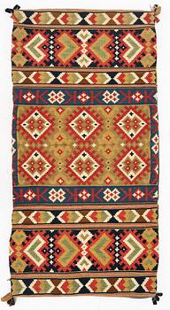 A carriage cushion, flat weave, Ingelstad district, Scania, mid-19th century.