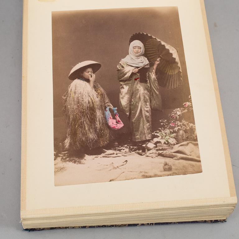 Two signed photographs of the Japanese crown prince and his wife and a photo album.