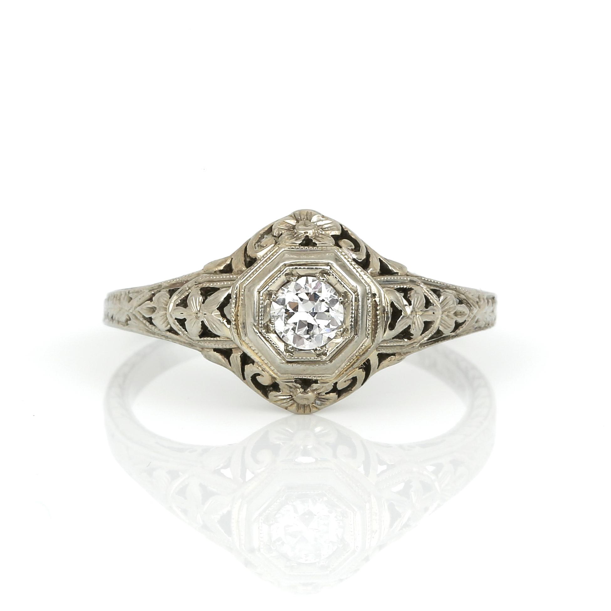 RING, 18K vitguld med briljantslipad diamant ca 0,20 ct, USA, 1900-talets första hälft. Total vikt ca 2,37 g.