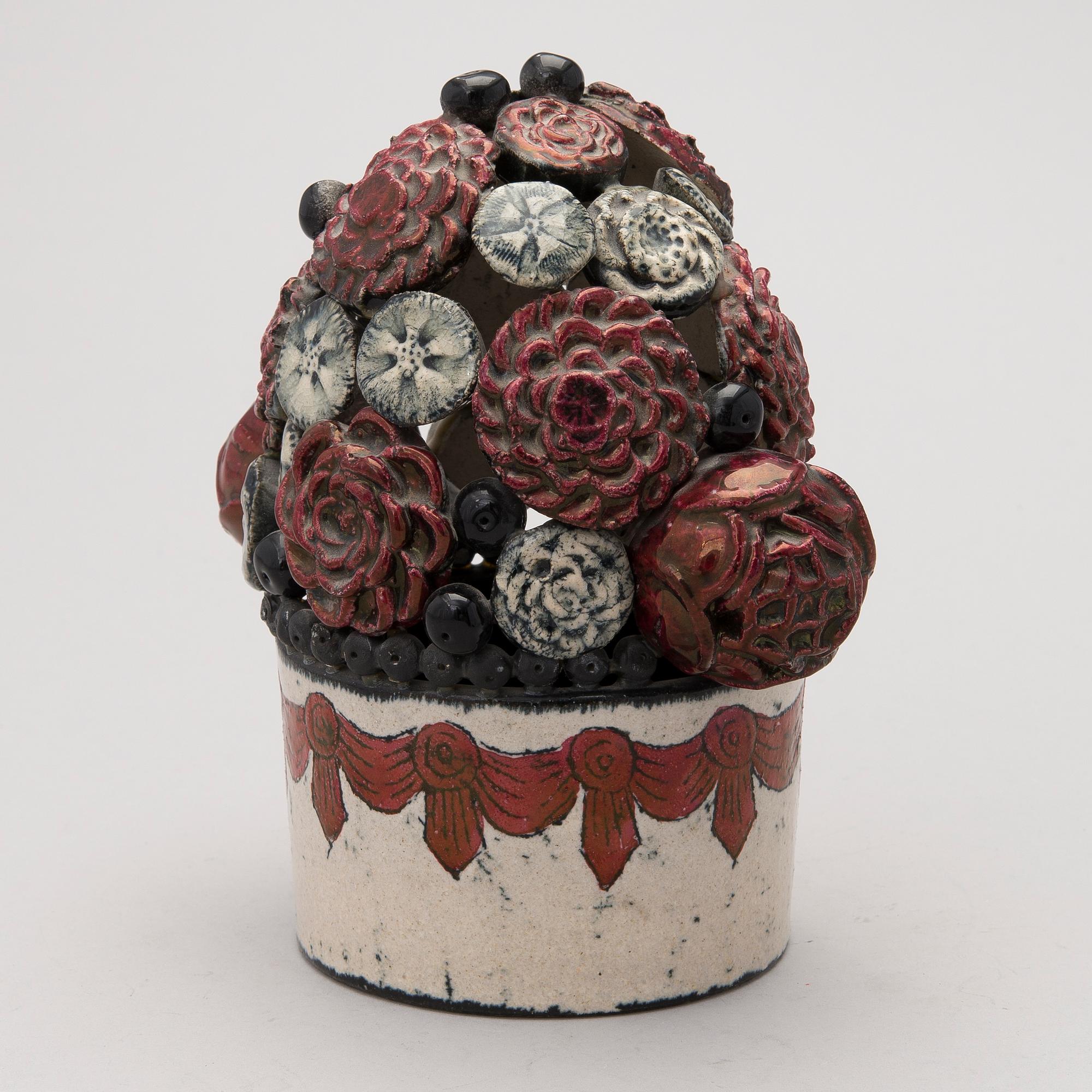 A stoneware sculpture, signed Kaipiainen Arabia.