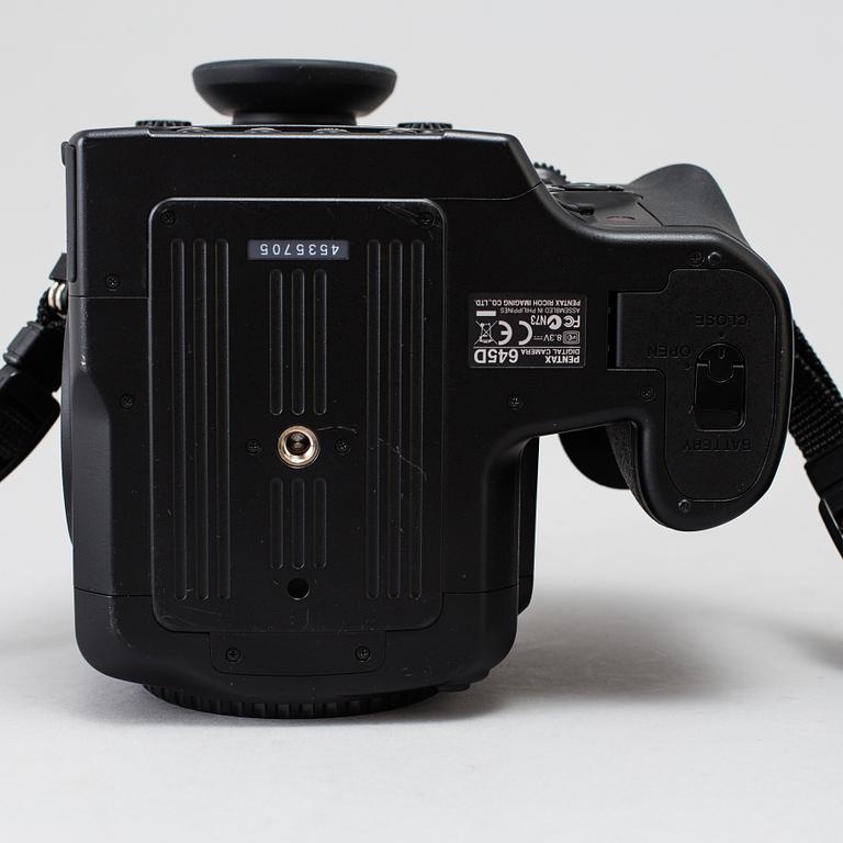 A black body medium format Pentax 645D camera with a SMC Pentax-D FA 645 55mm F2.8 AL [IF] SDM AW lens.