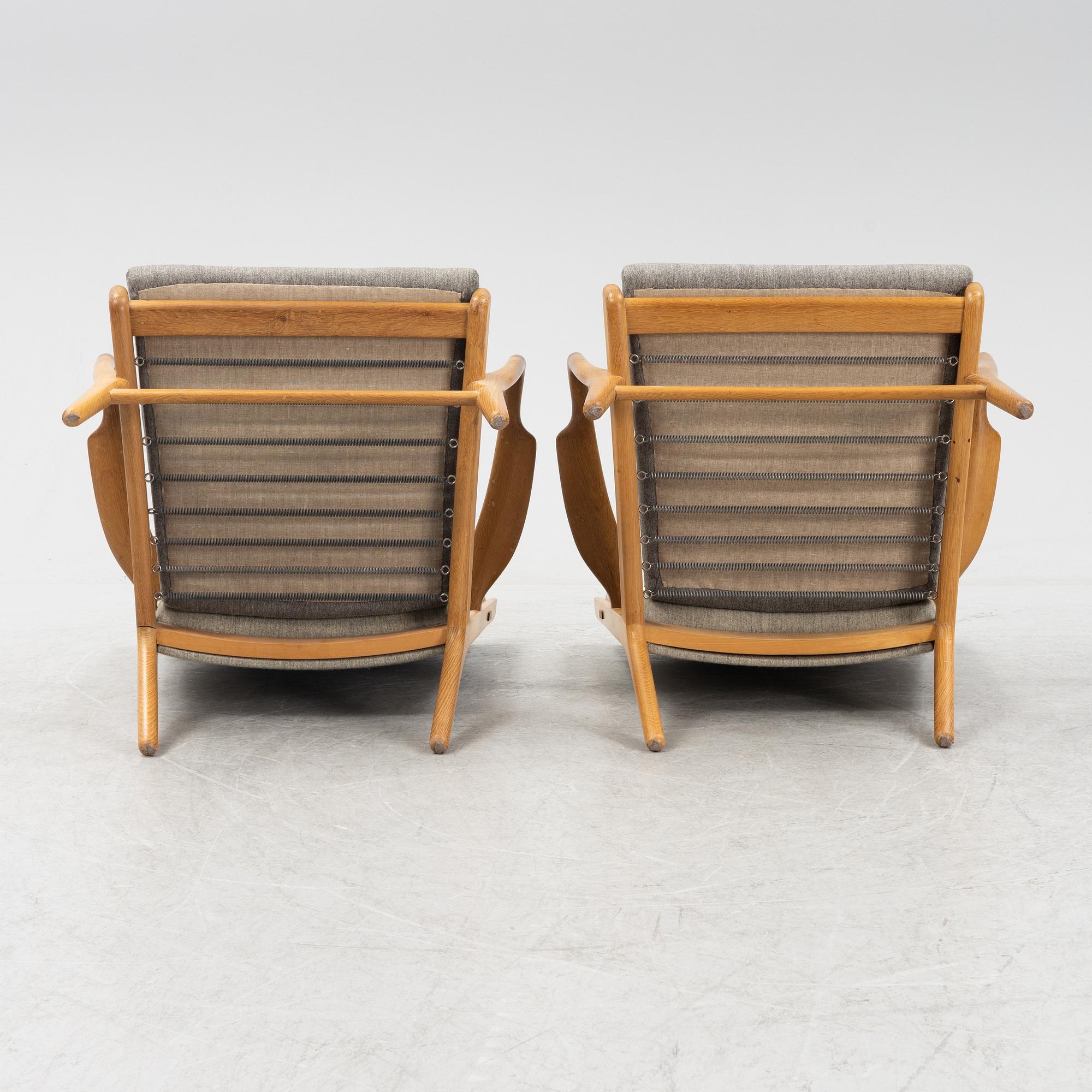 Hans J Wegner, a pair of model AP-16 armchairs, Denmark mid 20th century.