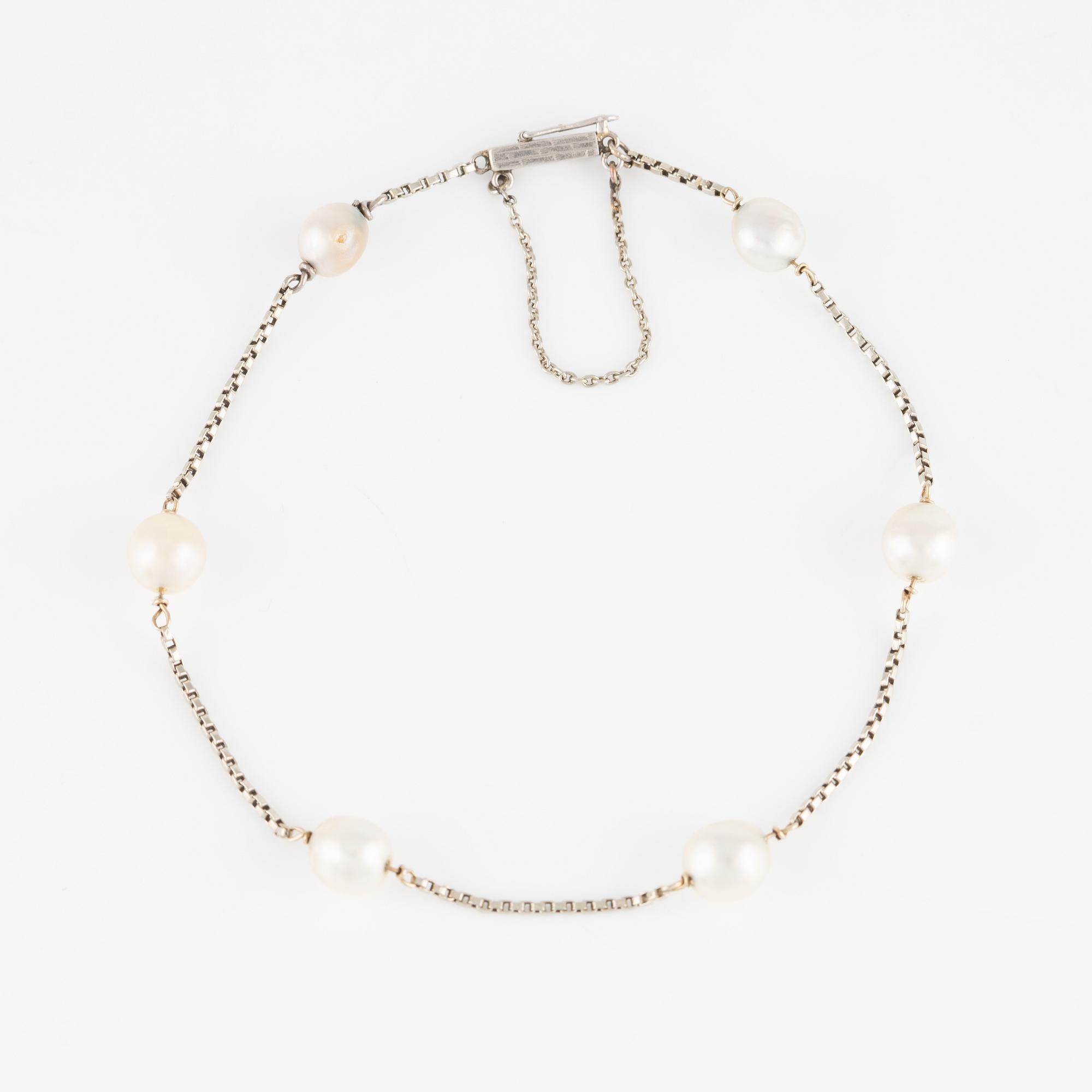 Armband, 18K guld med pärlor.