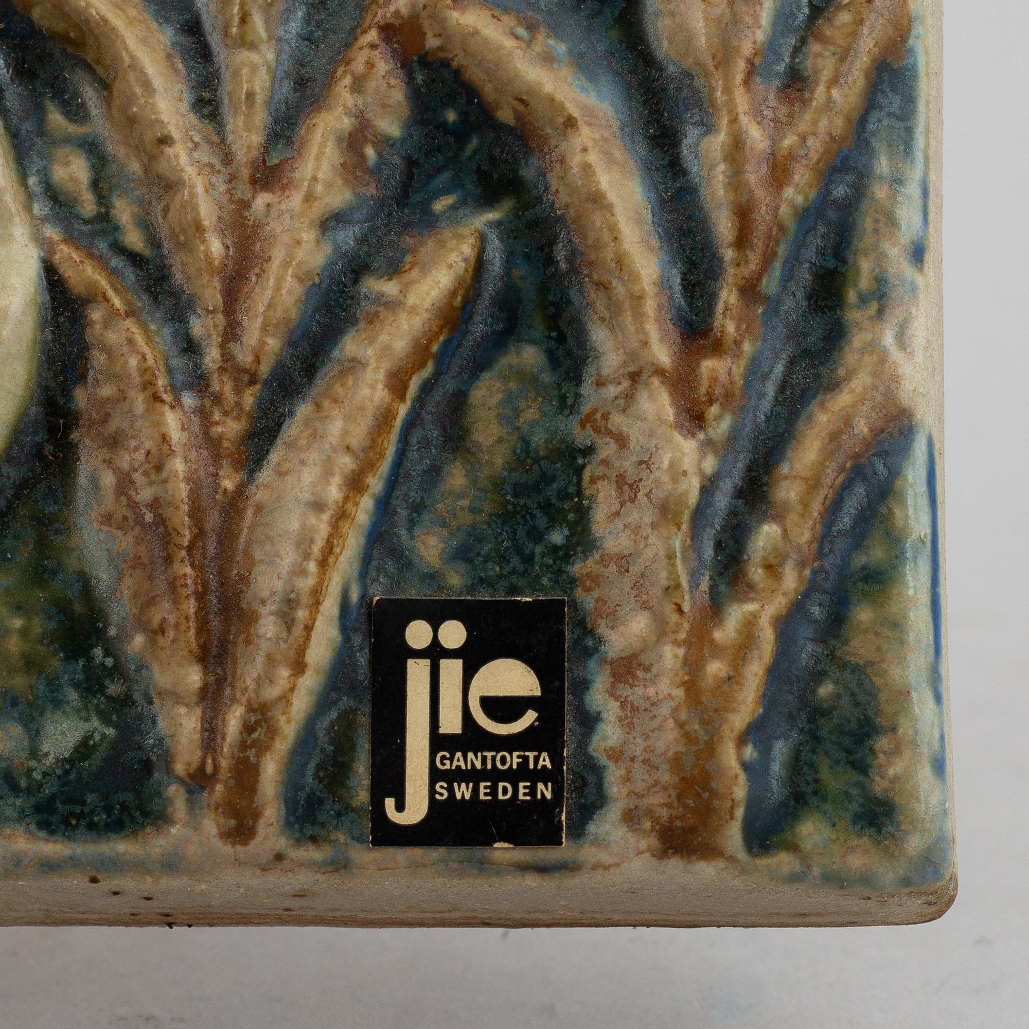 Two Swedish stoneware pieces, including a figurine by Lisa Larson, second half of the 20th Century.
