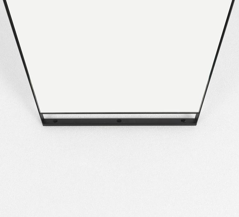 A specially ordered mirror made by the architect firm Guise, Sweden, 2011.