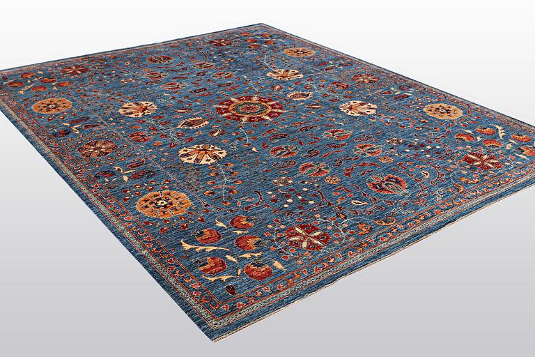 A carpet, Zeigler design, ca 312 x 254 cm.