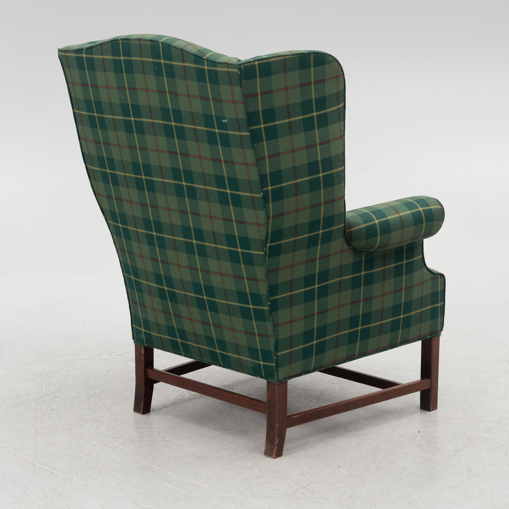 Ear flap armchair, second half of the 20th Century.
