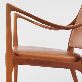 Hans Asplund, a walnut and leather easy chair, Nordiska Kompaniet, ca 1955, for the Nordiska Kompaniet beauty salon.