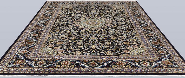 A Kashmar carpet, approx. 335 x 248 cm.