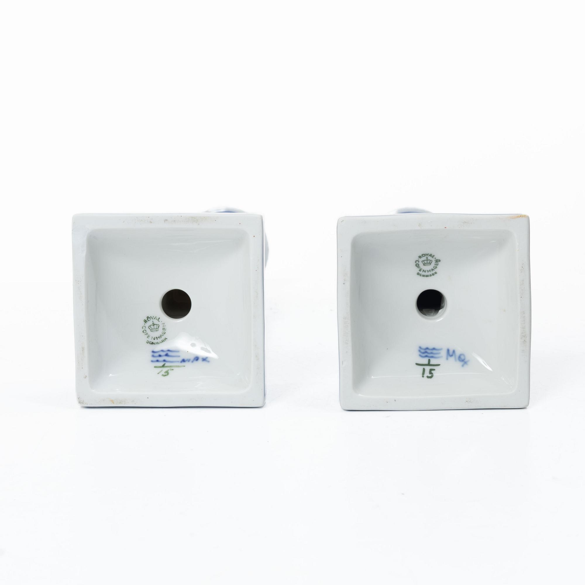 Royal Copenhagen, Candlesticks, a pair, porcelain, "Musselmalet", Denmark, 1935–1936 & 1980–1984.