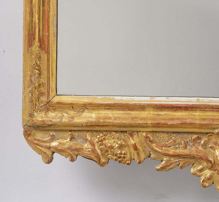 A rocococ giltwood mirror, Stockholm, later part 18th century,