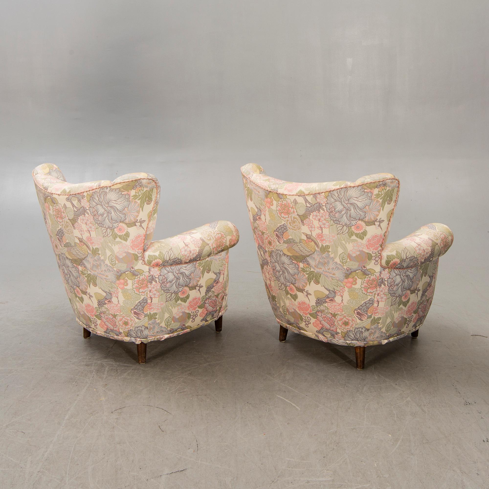 A pair of 1940s easy chairs.