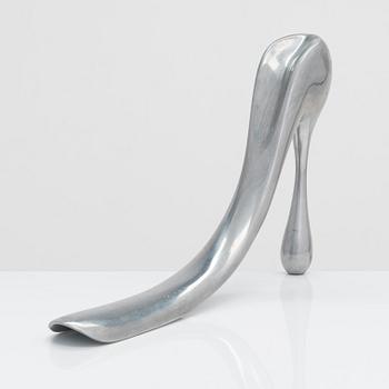 A metal shoe horn by Manolo Blahnik, 2000s.