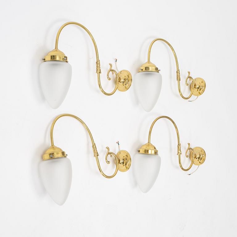 Four brass wall lights, second half of the 20th Century.