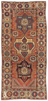 268. An antique Konya long rug, c. 324 x 144 cm.