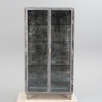 A glazed cabinet, second half of the 20th Century.