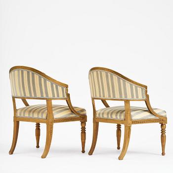 A pair of late Gustavian open armchairs attributed to E. Ståhl (master in Stockholm 1794-1820).