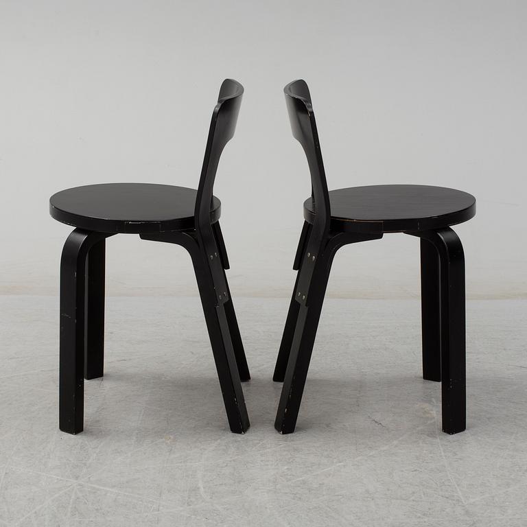 ALVAR AALTO, a pair of painted model 65 chairs from Artek, Finland.