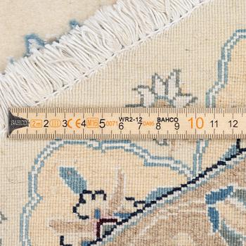 A Nain rug, diameter a. 247 cm.