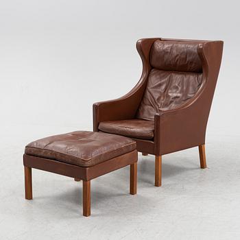 Børge Mogensen, a leather easy chair and foot rest, model 2204, Frederica Stolefabrik, Denmark,