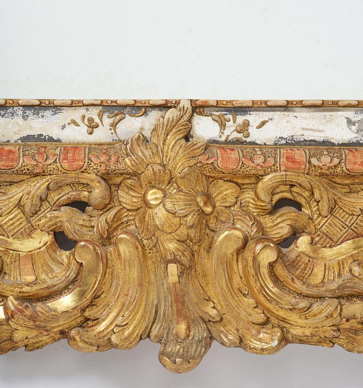 A rococo giltwood mirror attributed to N. Meunier (master in Stockholm 1754-97).