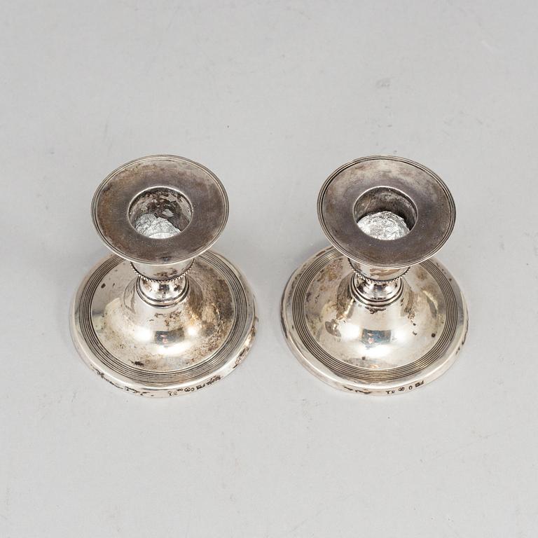 A pair of Swedish small early 19th century silver candle sticks, mark of Pehr Zethelius, Stockholm 1805.