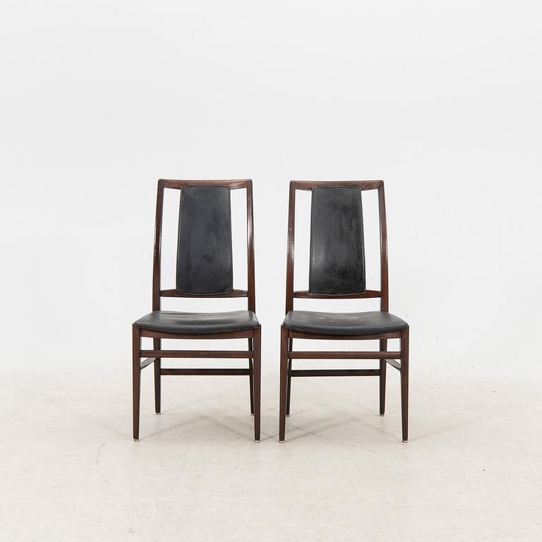 A table and four chairs in lacquered mahogany by David Rosén, "Triva-diné", middle of the 20th century.