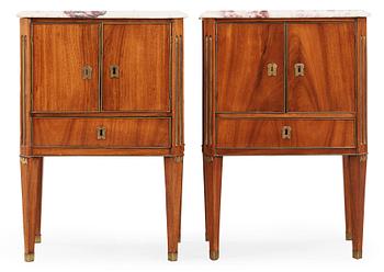 A pair of late Gustavian late 18th century chamber pot cupboards.