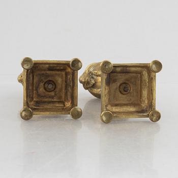 A pair of Louis XVI-style candlesticks, late 19th century.