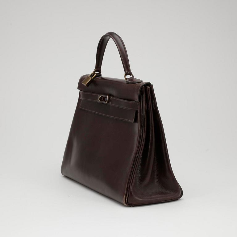 HERMÈS, a brown calf leather "Kelly 32" bag from the 1960s.