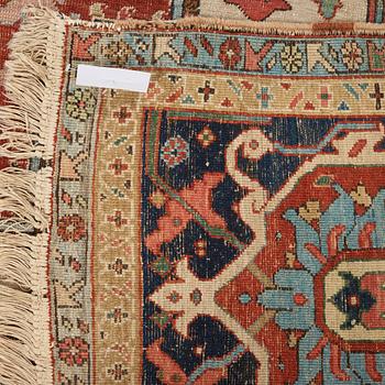 A CARPET, an antique Heriz, 476,5 x 344,5 cm.