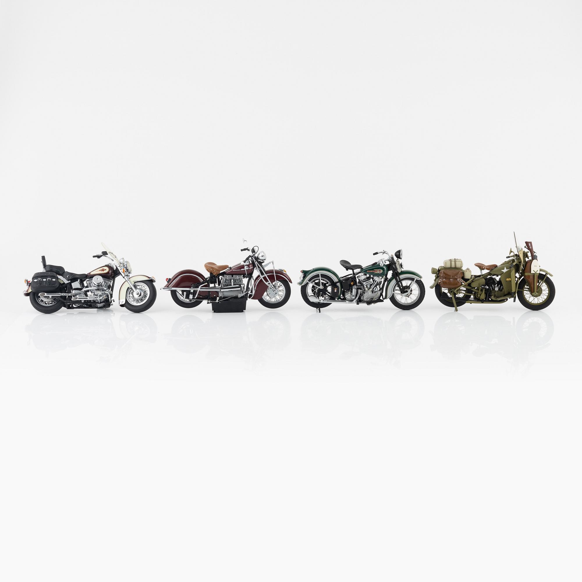 Four die cast model cars and four die cast model motor bikes, Franklin Mint.