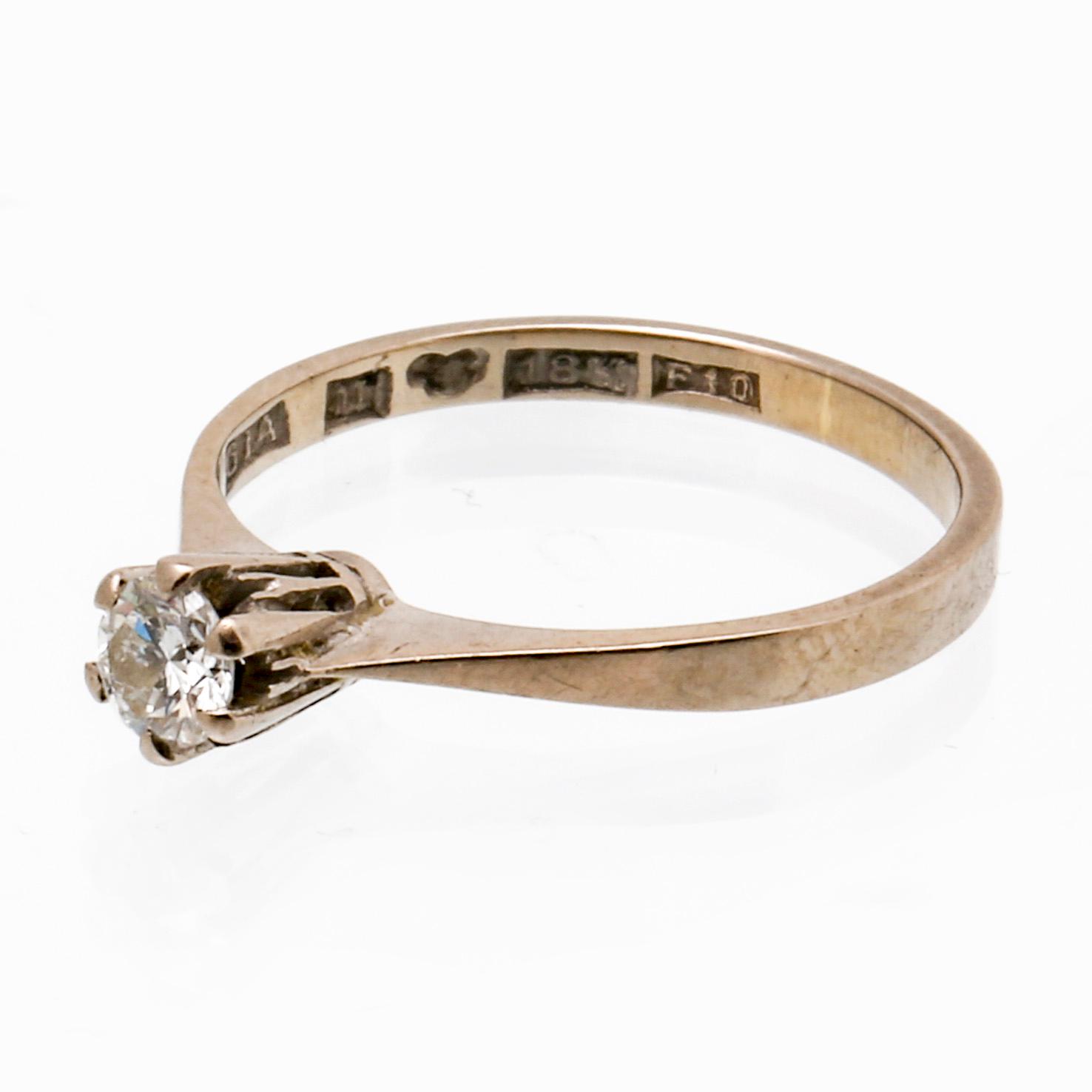 Ring 18K whitegold 1 brilliant-cut Diamond 0,20 ct engraved.