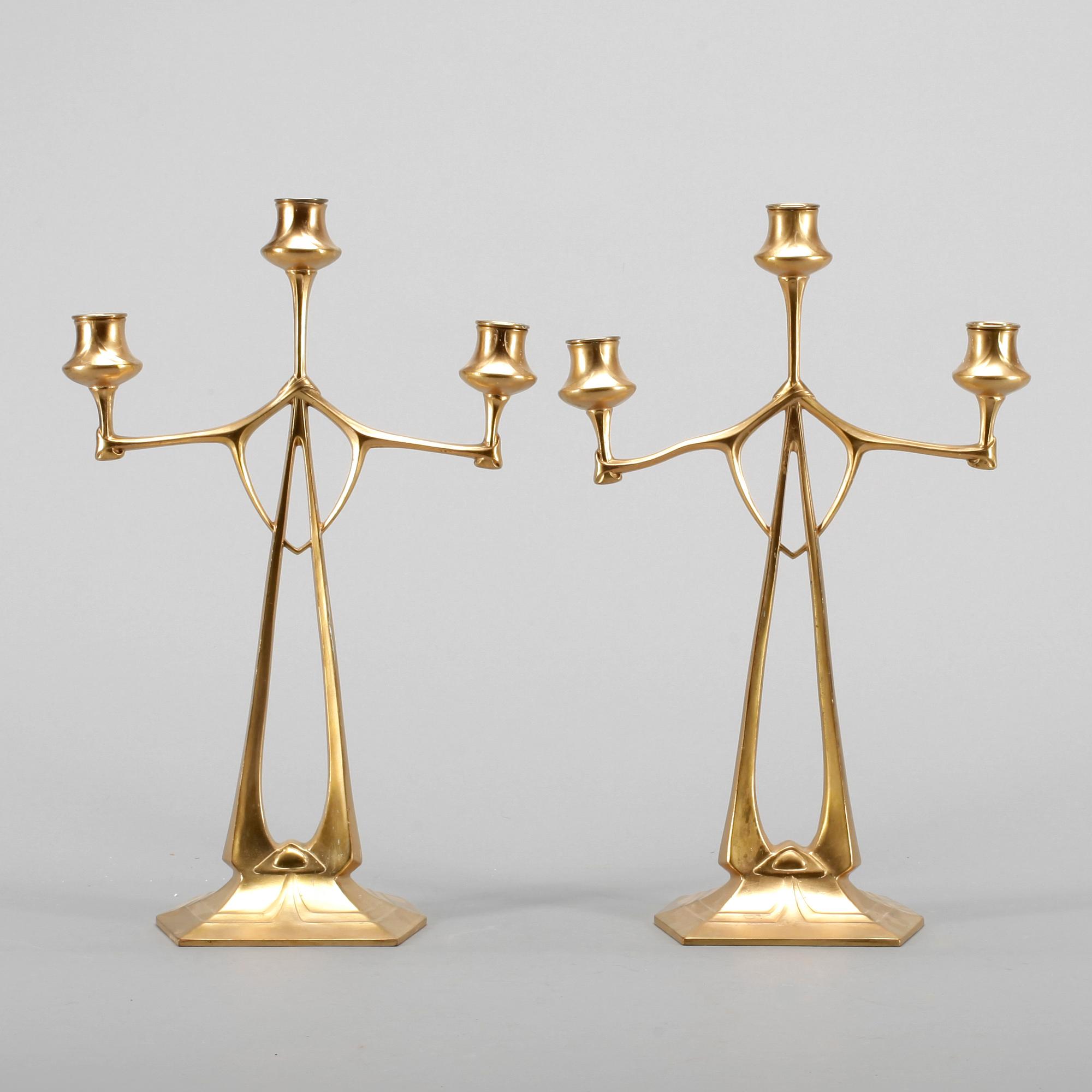 KANDELABRAR, ett par, gulmetall, jugendstil, 1900-tal.