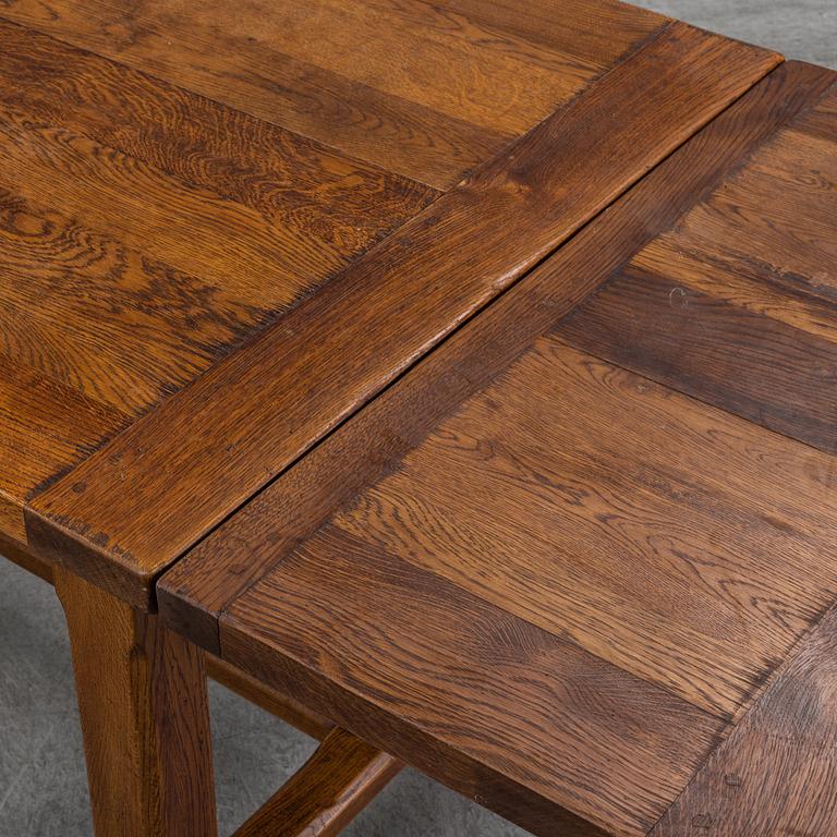 A mid 20th century oak dining table.