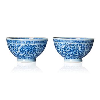 A pair of blue and white bowls, Qing dynasty with Yongzheng mark and of the period (1723-35).