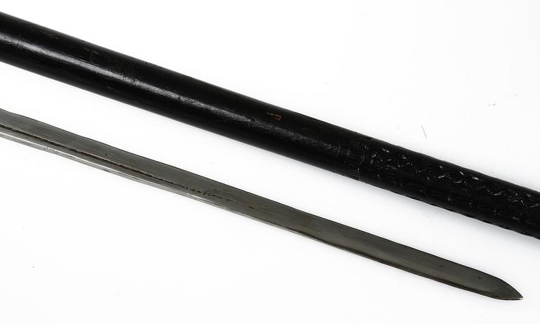 KÄPP/SVÄRD, trä, 1900-tal.