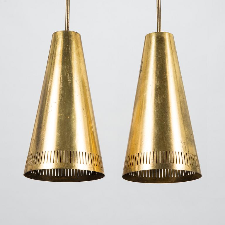 Paavo Tynell, a pair of 1953 pendant lights for Taito.