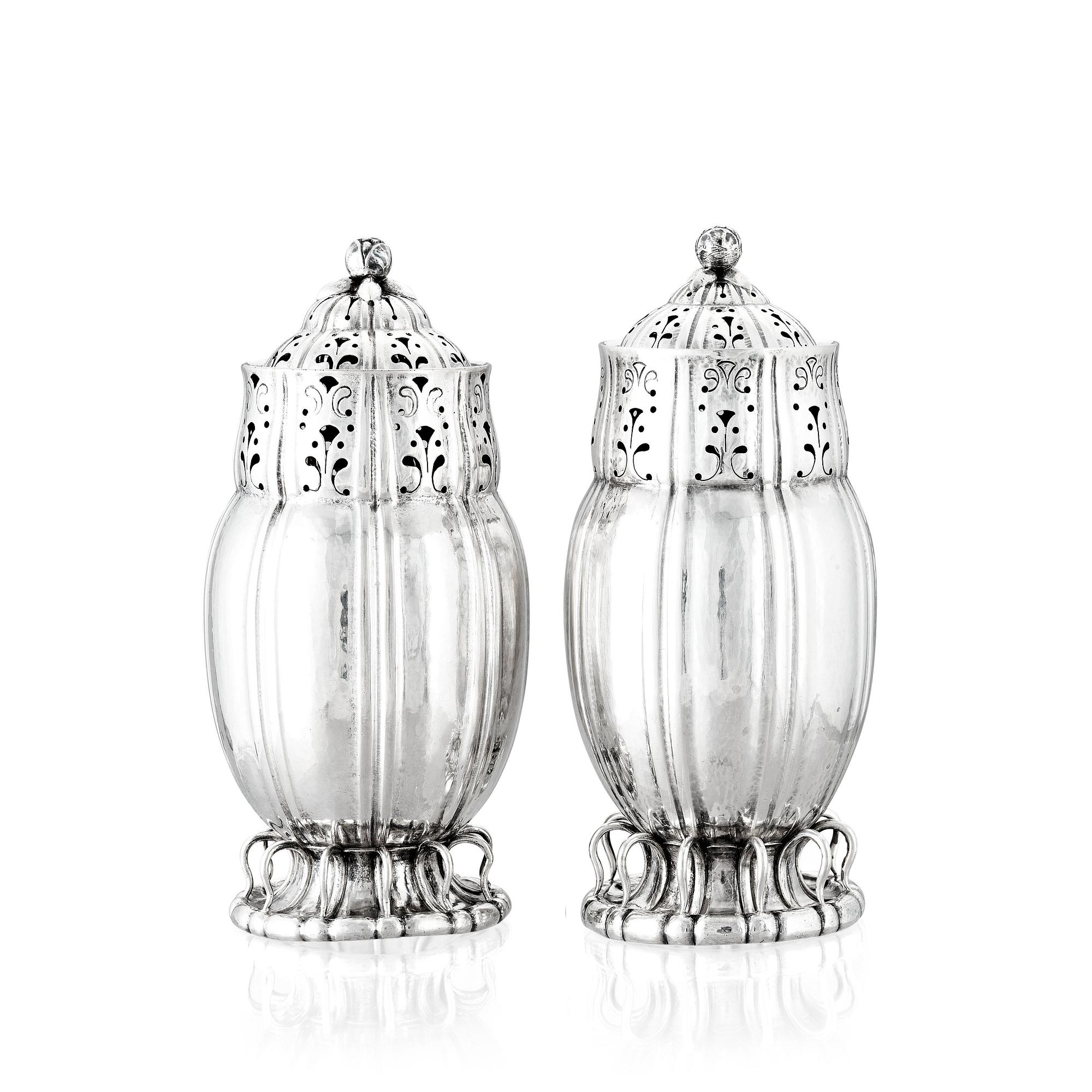 Georg Jensen, a pair of sugar casters, Copenhagen ca 1915-1919, 830/1000 silver, design nr 4.