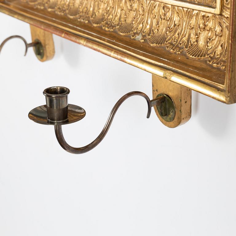 A mirror wall sconce for two candles, Empire, first half of the 19th Century.