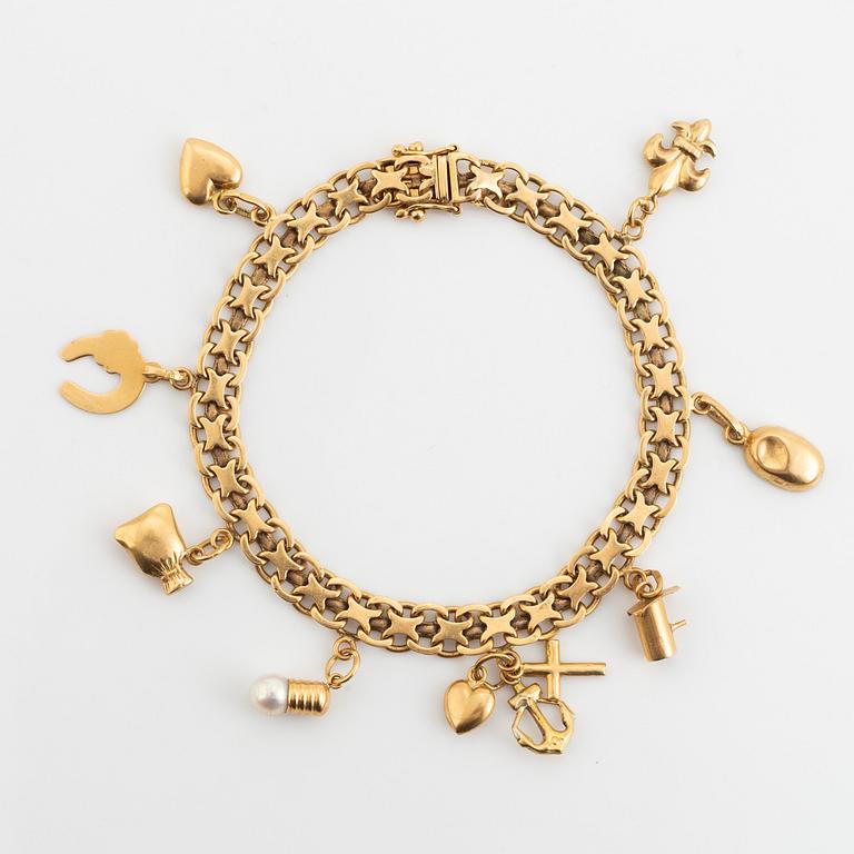 18K gold bracelet, with charms.