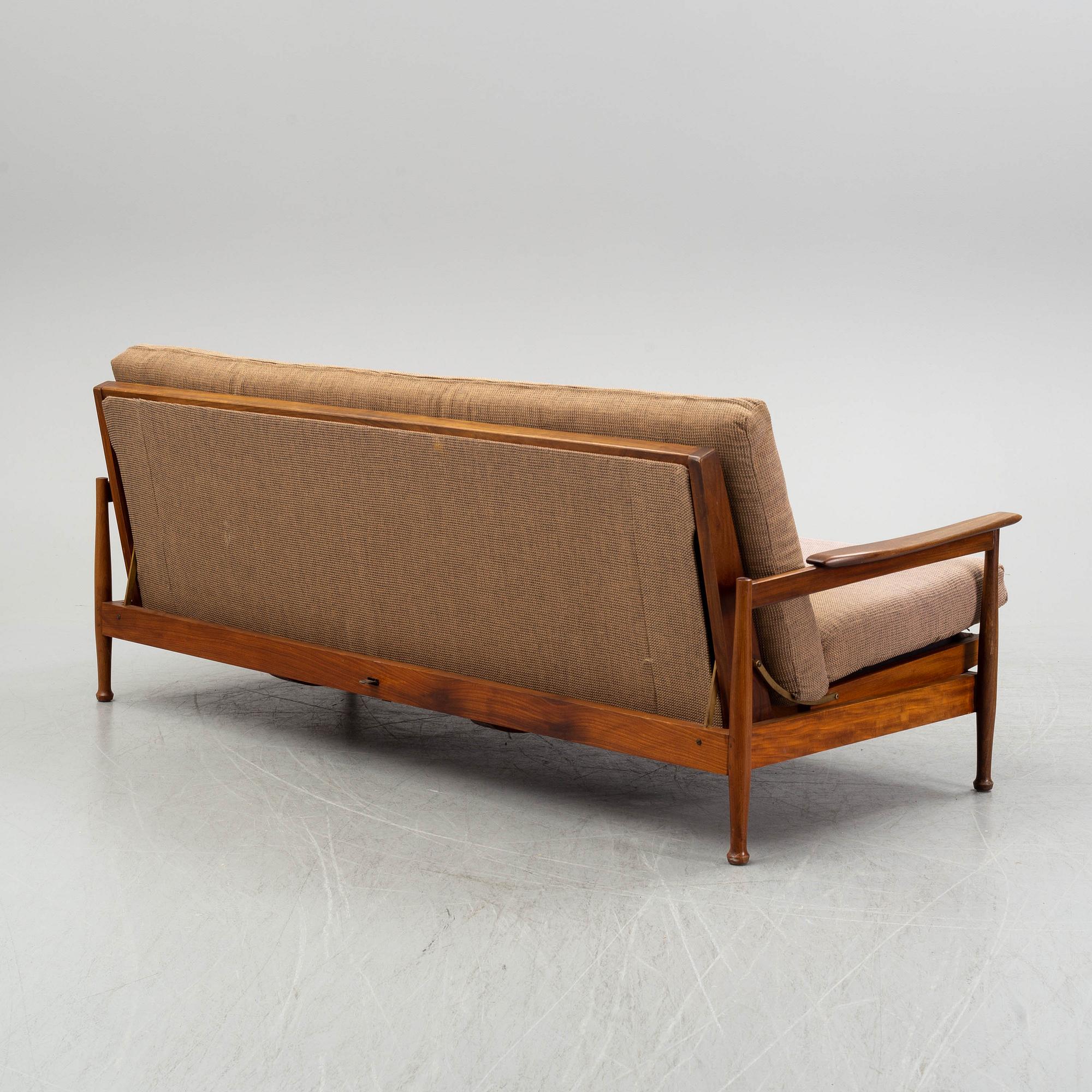 George Fejer & Eric Phamphilan, a British 'Manhattan' sofa and two easy chaits from Guy Rogers, 1960's.