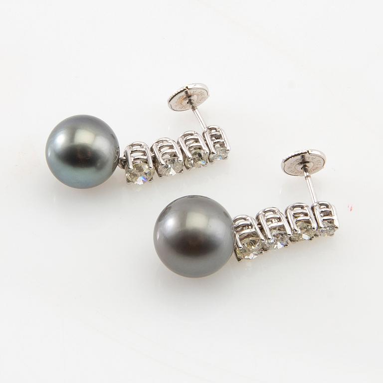Earrings, a pair of 18K white gold with diamonds and cultured pearls.